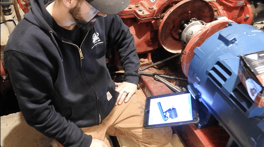 technician working in a field service video